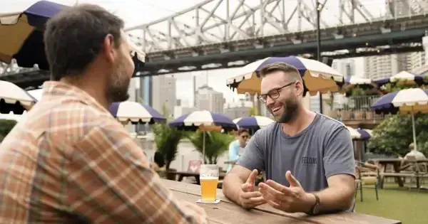 Two men enjoying a beer at Felons Brewing Co, Brisbane