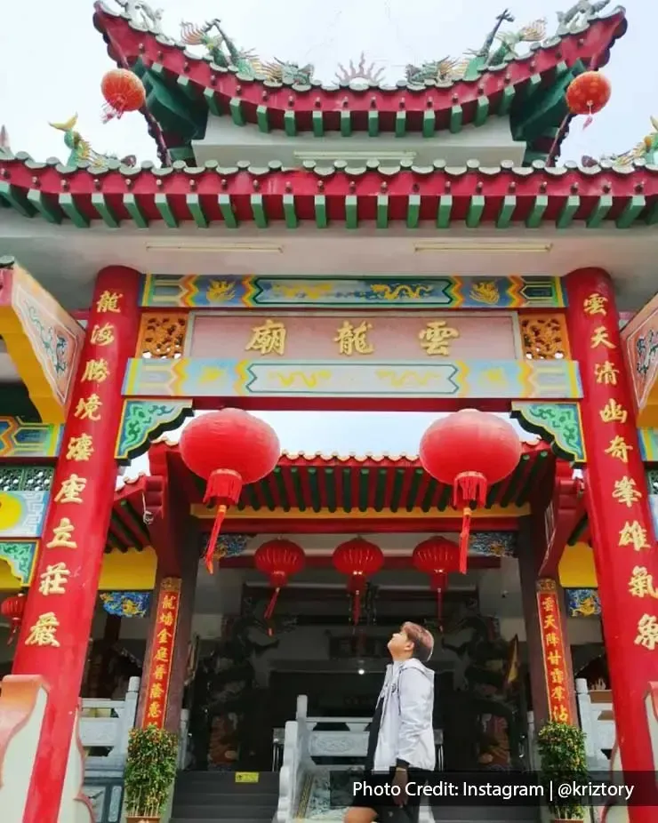 A man was taking a picture at Wan Loong Chinese Temple - Grand Lexis Port Dickson