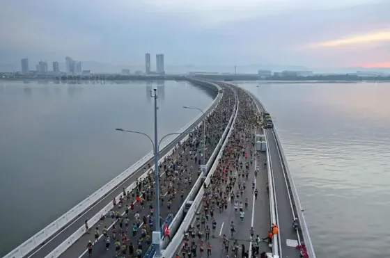 Aerial view of thousands of runners on the Penang Bridge taking part in the Penang Bridge International Marathon