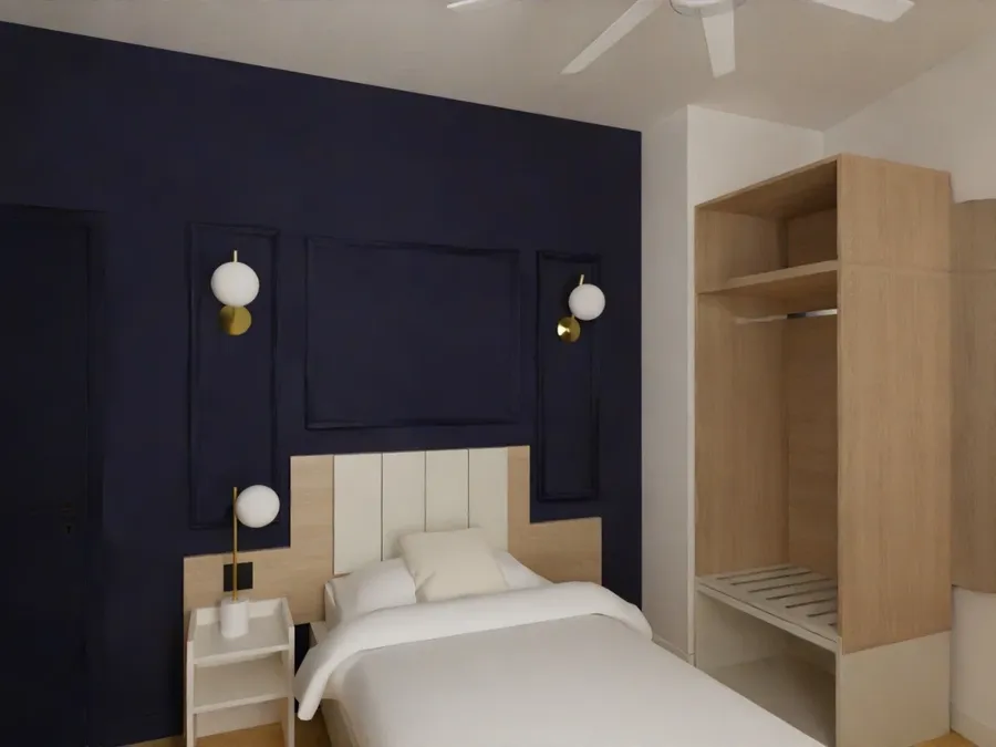 Chambre élégante pour une personne avec lit simple et décor moderne chez Les Sources Callou à Vichy.