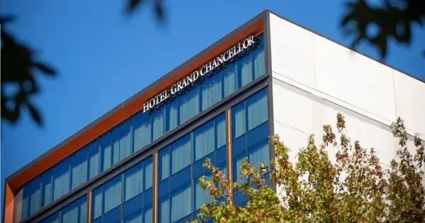 Exterior of Hotel Grand Chancellor under a blue sky