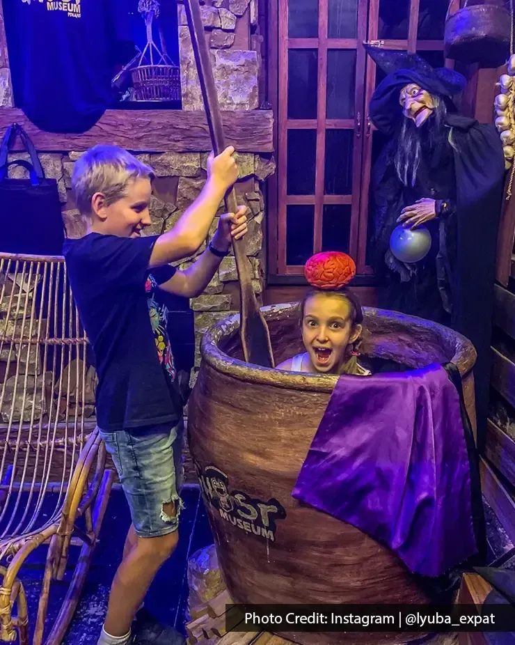 Kids playing in spooky setup at Ghost Museum Penang – Lexis Suites Penang