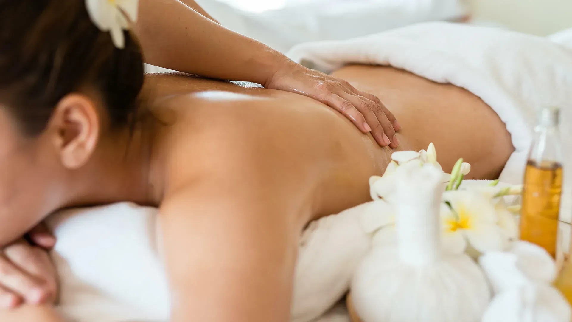 A lady having a massage in the Spa at FA Puerto Vallarta