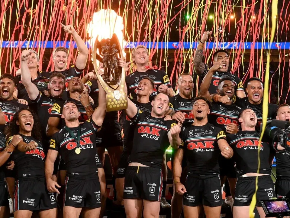 Panthers NRL Home Games with players celebrating a victory on stage.