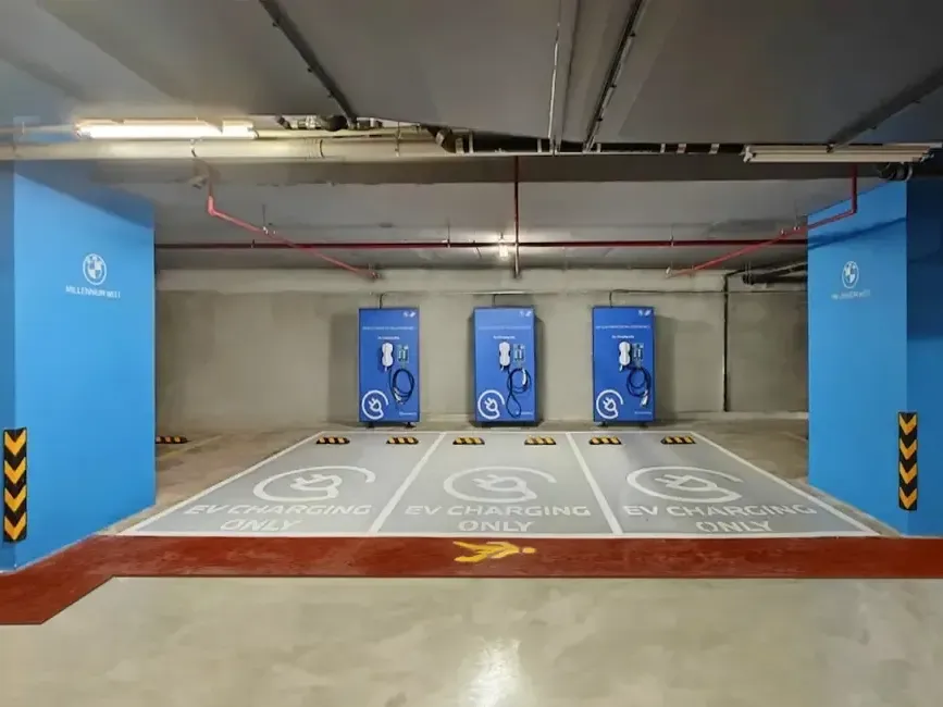 A row of EV charging stations in a carpark - Lexis Hotels & Resorts