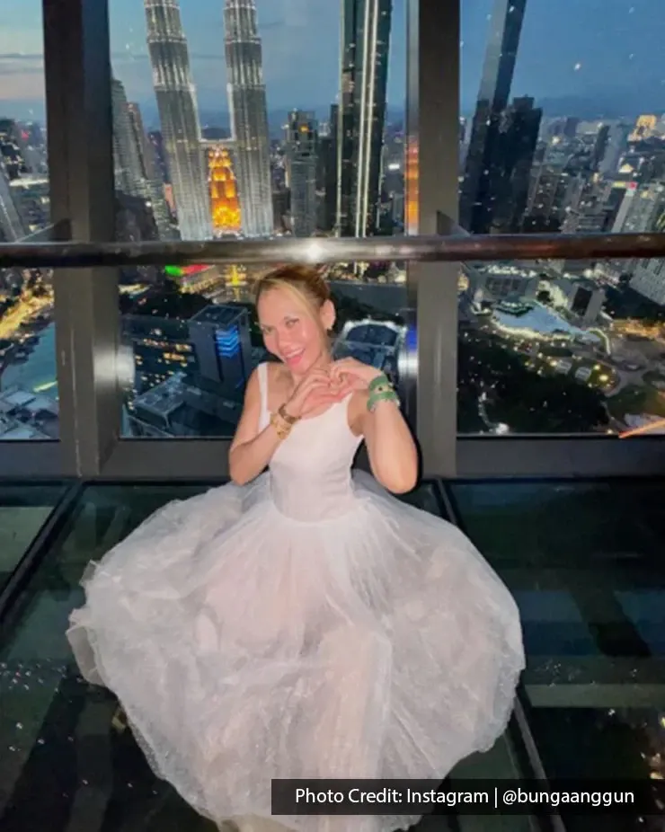Woman posing on SkyDeck at Imperial Lexis Kuala Lumpur