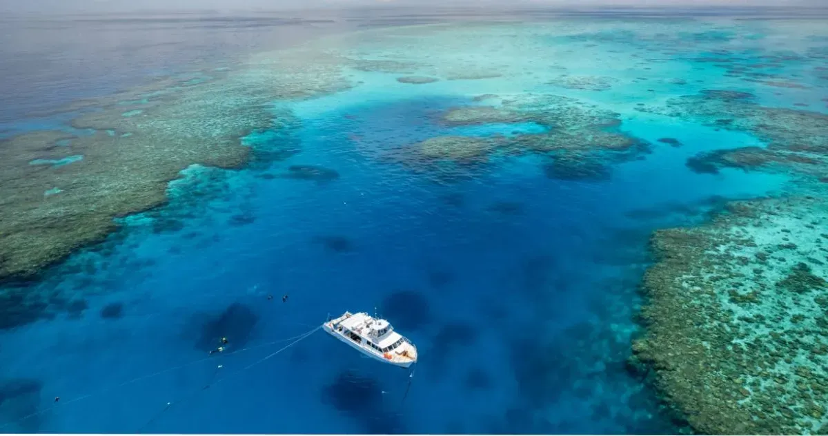 A dive boat floating near the reef and Magnetic Island’s snorkel trails