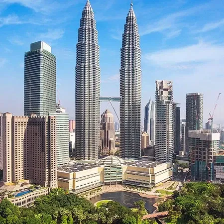 Aerial view of the Petronas Twin Towers and Kuala Lumpur skyline