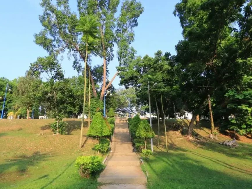 Scenic view of Seremban Lake Gardens with lush greenery and clear blue skies - Lexis Port Dickson