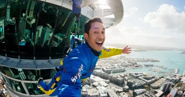  A man takes a selfie on the SkyJump at Auckland's Sky Tower.