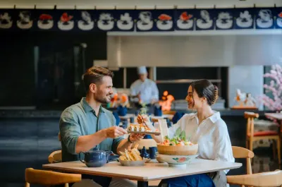 Couple enjoying japanese cuisine at UMI Japanese Restaurant - Lexis Hibiscus Port Dickson