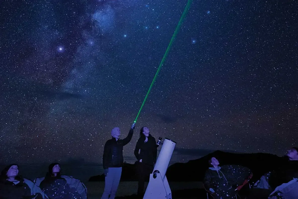 Overnight adventurers stargazing in Great Barrier Island, Auckland