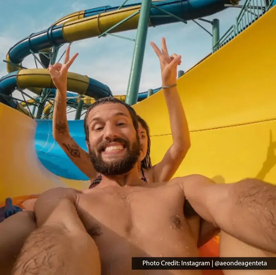 Visitors enjoying a thrilling slide adventure at Escape Theme Park