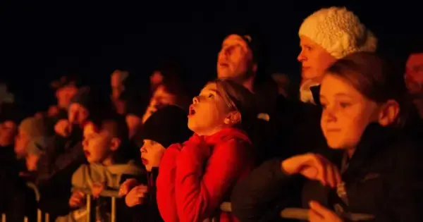 A child looks in wonder at the Dark Mofo festivities in Hobart.