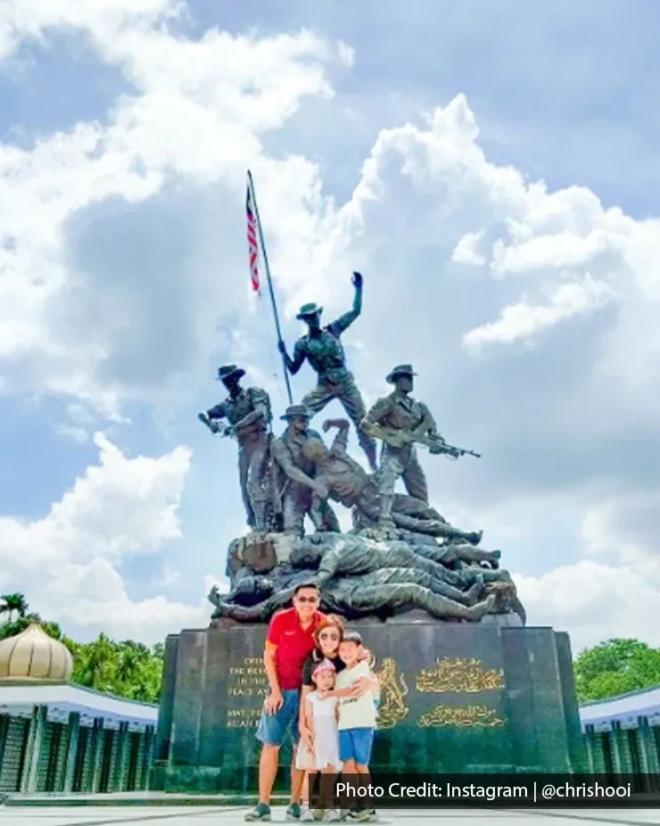 Visitors taking a family photo at the National Monument
