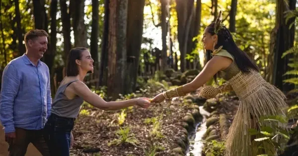 Maori woman greets tourists at Rotorua