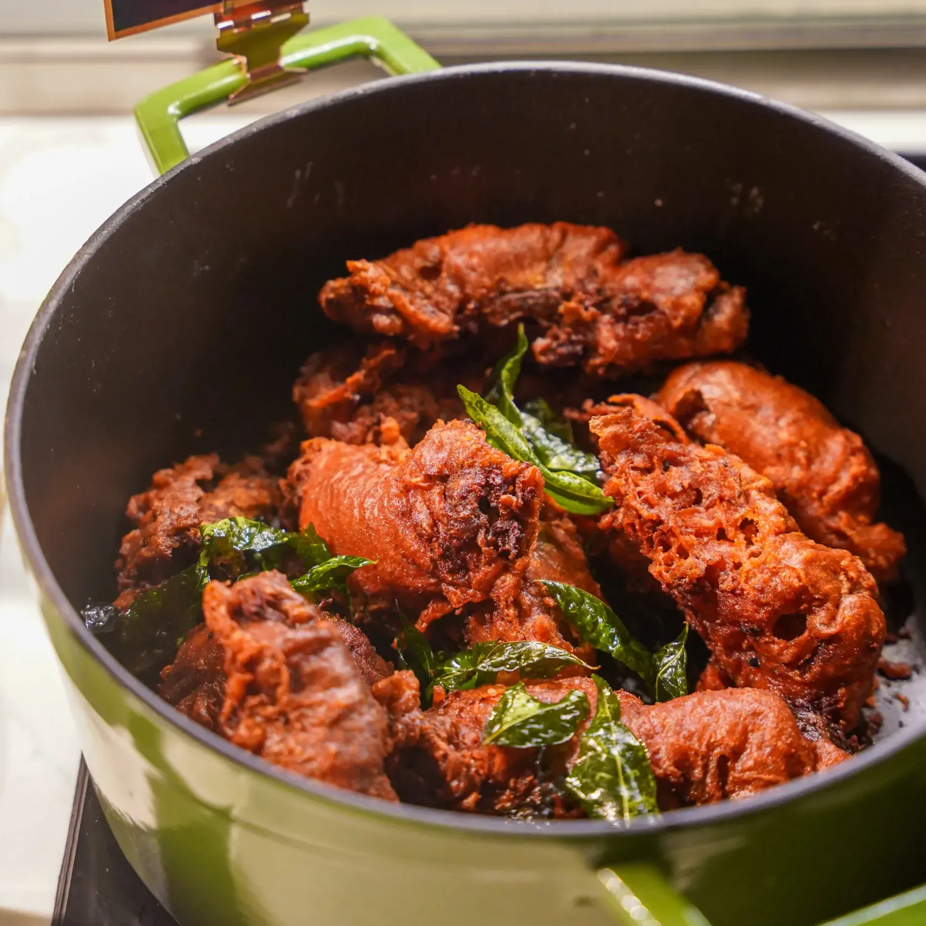 A fried chicken dish placed in a pot at Roselle Coffee House, Imperial Lexis Kuala Lumpur - Lexis Hotels & Resorts