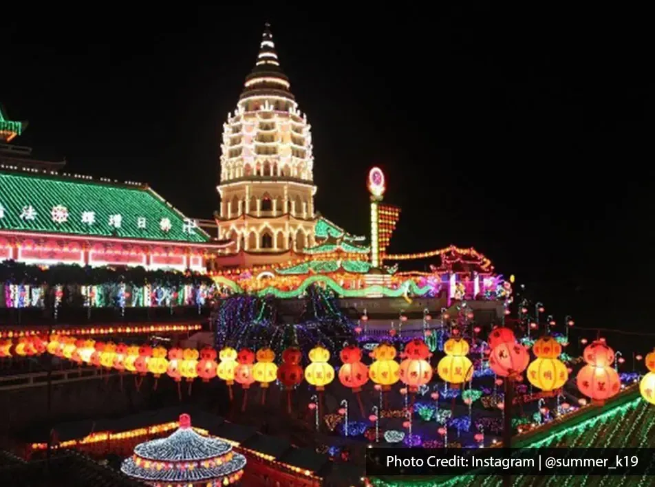 Majestic view of Kek Lok Si pagoda glowing at night.