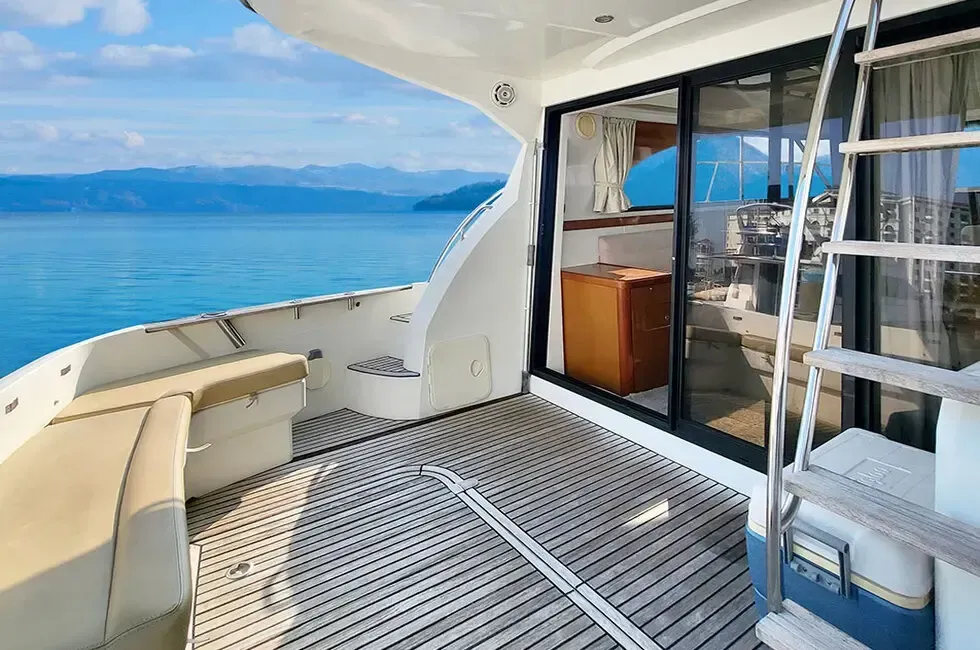 A boat deck overlooking calm water - Lexis Hibiscus Port Dickson