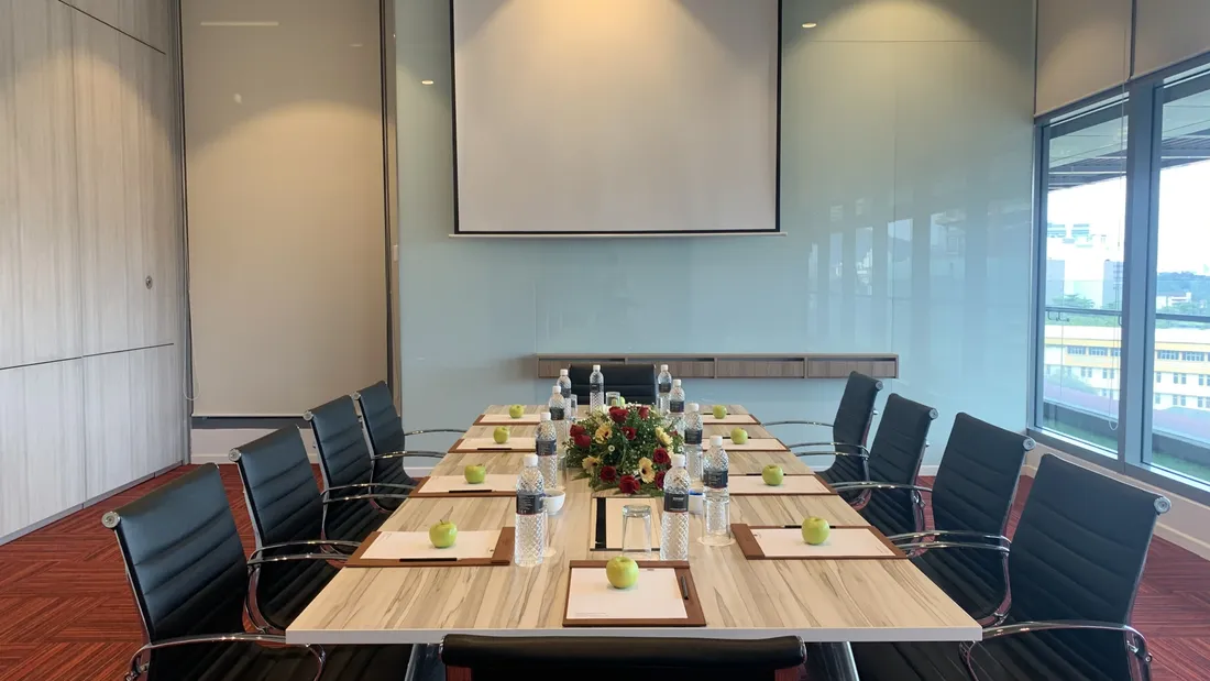 Meeting and Event Packages offer a conference room with a long table, chairs, and a projector screen.