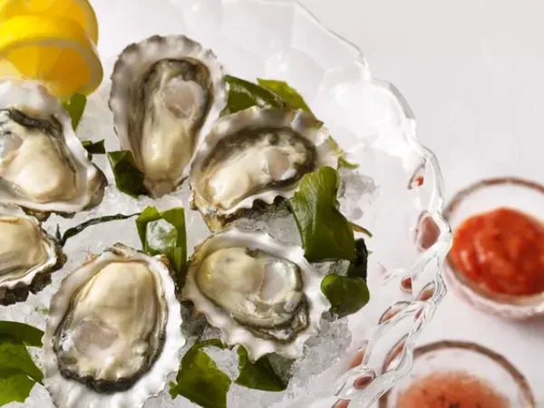 Beautifully plated oysters at The Surf Club Restaurantat The Surf Club Restaurant by Thomas Keller in Surfside