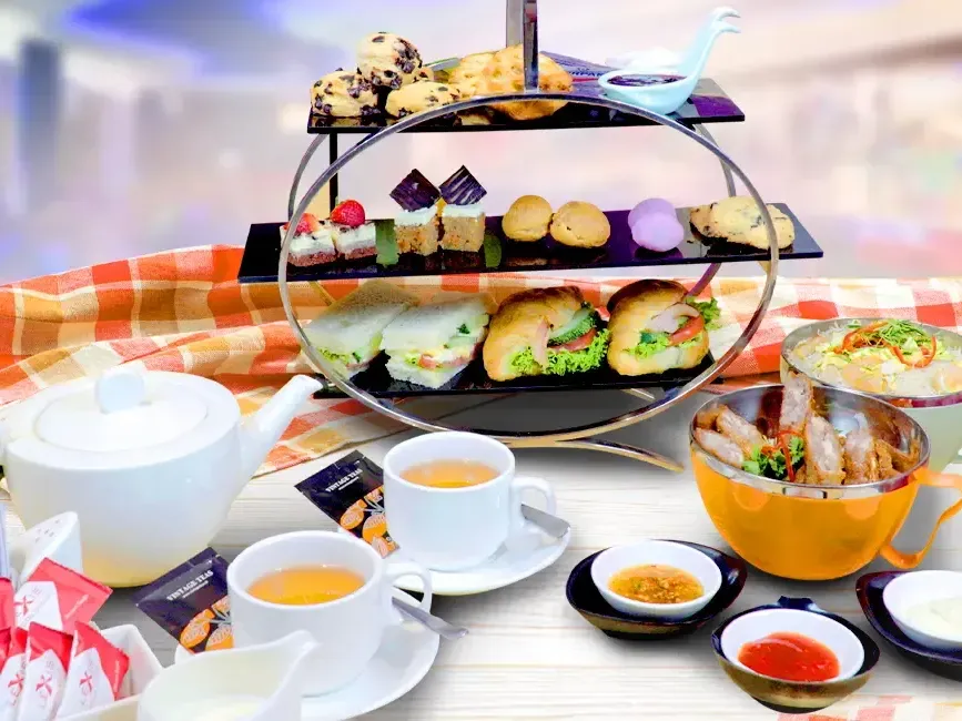 A dining table filled with various dishes - Lexis Suites Penang