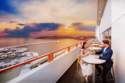 Couple toasting drinks in the resort bar - Lexis Hibiscus Port Dickson