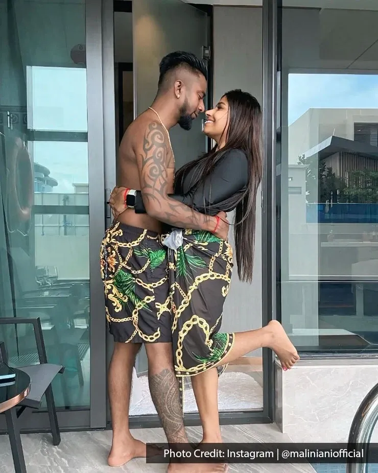 Couple enjoying a private pool during a romantic retreat in Kuala Lumpur.