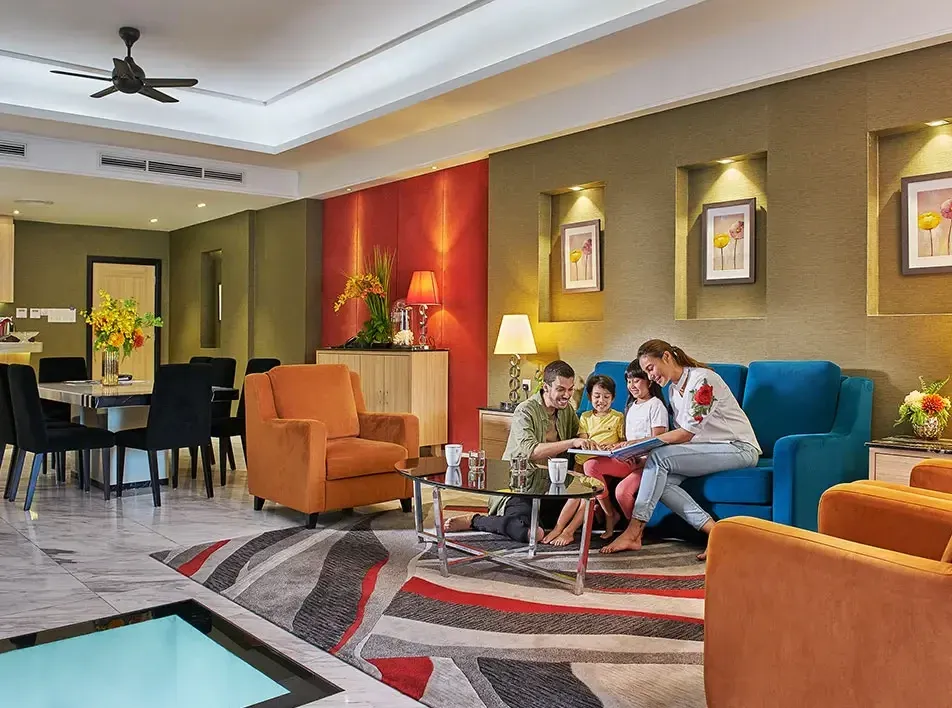 A family enjoying their short vacation at a luxury hotel in Malaysia - Lexis MY