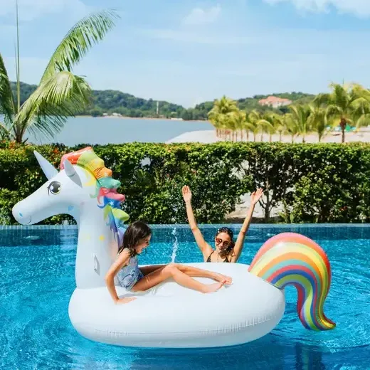 Mother and daughter enjoying the pool on the unicorn float at Lexis Hibiscus Port Dickson - Lexis Hotels & Resorts