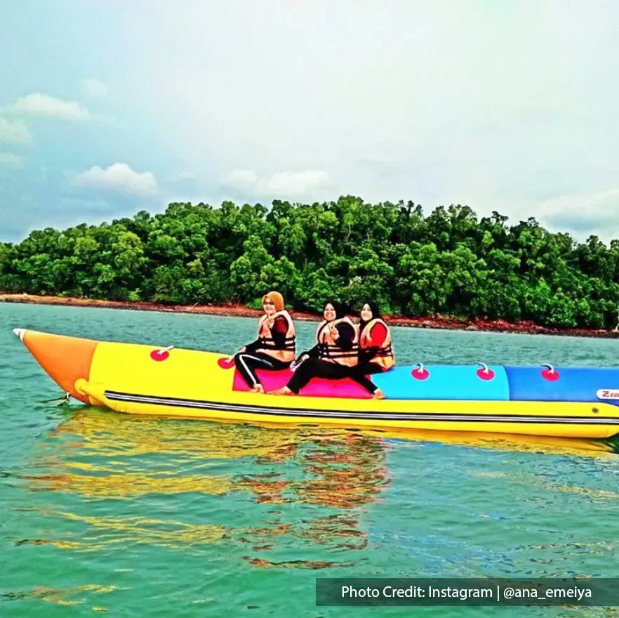 Fun banana boat rides in Teluk Kemang Beach Port Dickson