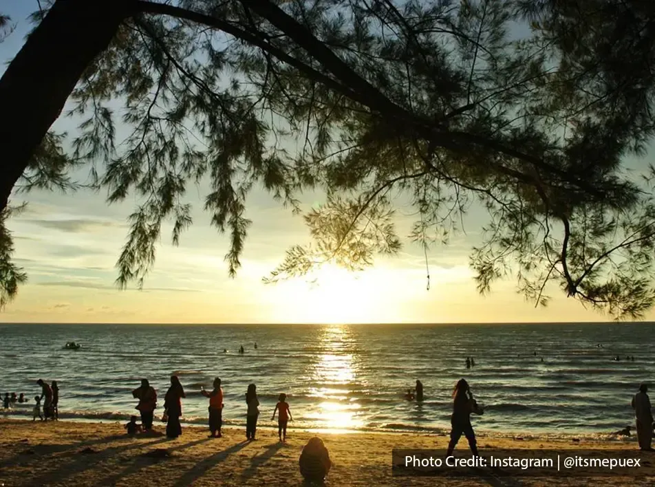 People enjoying walking by the Port Dickson beach with sunset view - Lexis Hibiscus Port Dickson