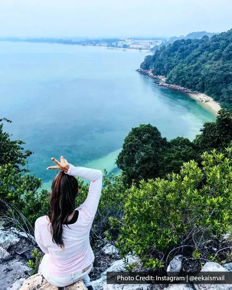 Girl posing at Cape Rachado Lighthouse