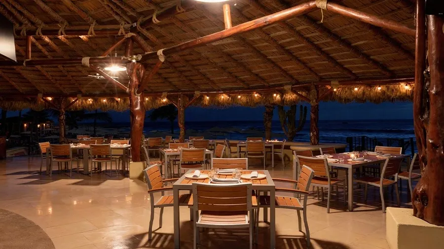 Outdoor dining area at El Canto de las Sirenas restaurant at Hacienda Del Mar Los Cabos - Redesign in Cabo San Lucas.