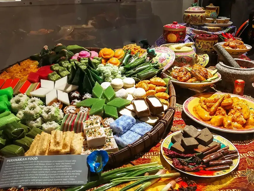 A table filled with realistic replicas of beloved Malaysian dishes at Penang Wonderfood Museum - Lexis Suites Penang