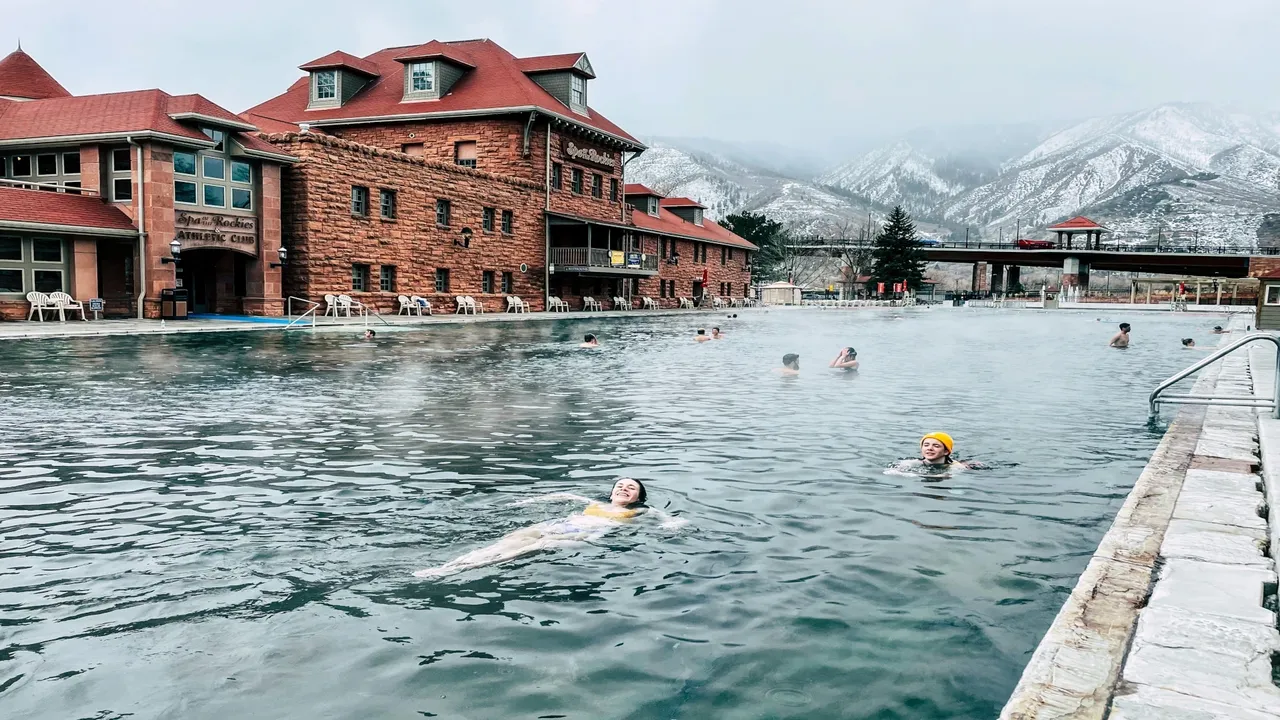 People enjoy a swim in the hot springs pool near  Canmore.