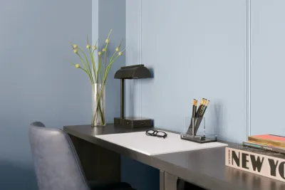 Work desk with a floral vase in King Room at Kixby Hotel