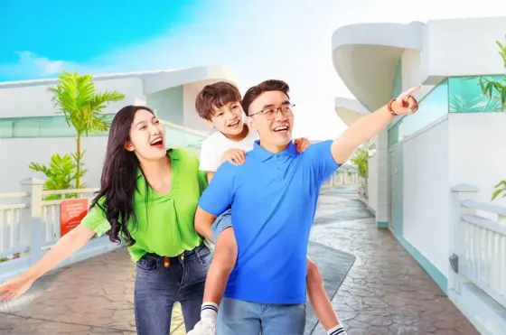A family enjoying their holiday at a luxury resort - Lexis Hotels & Resorts