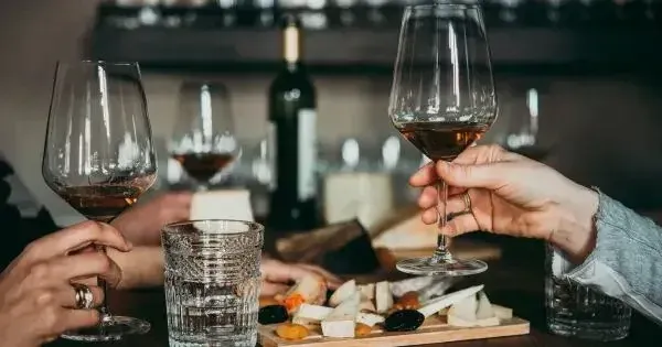 Friends sharing drinks at a Wellington bar