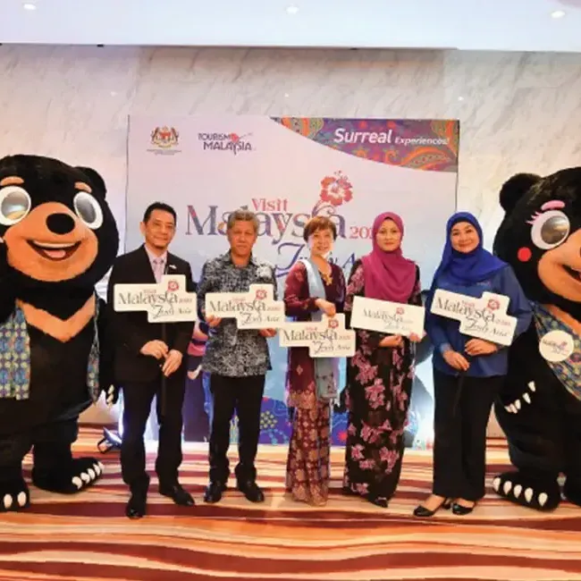 Representatives from Tourism Malaysia posing for a photo outside of Hibiscus Grand Ballroom at Lexis Hibiscus Port Dickson - Lexis Hotels & Resorts