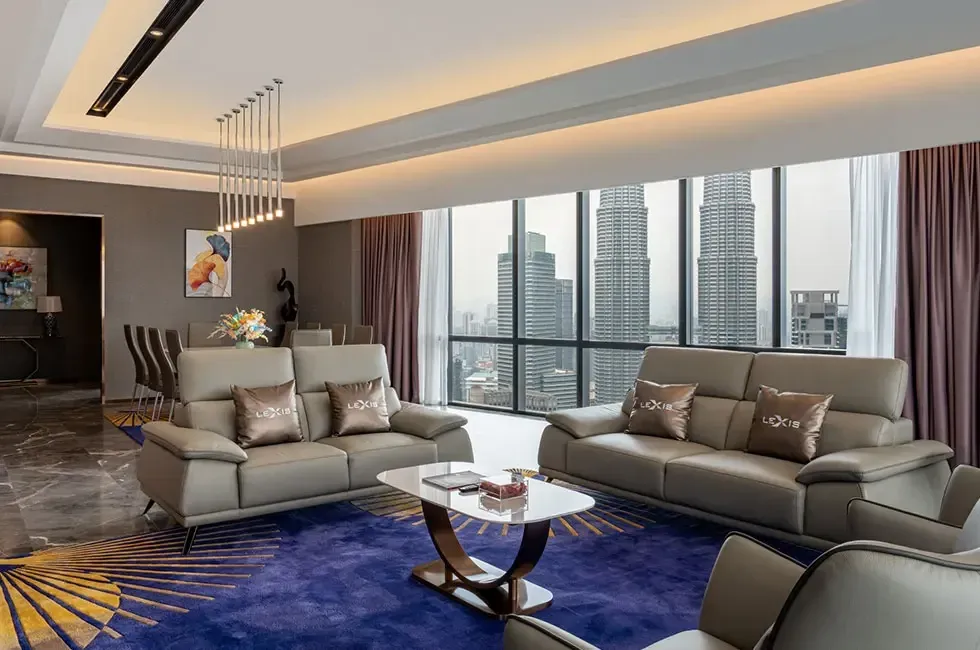Spacious living room in the Presidential Suite with a city view - Imperial Lexis Kuala Lumpur