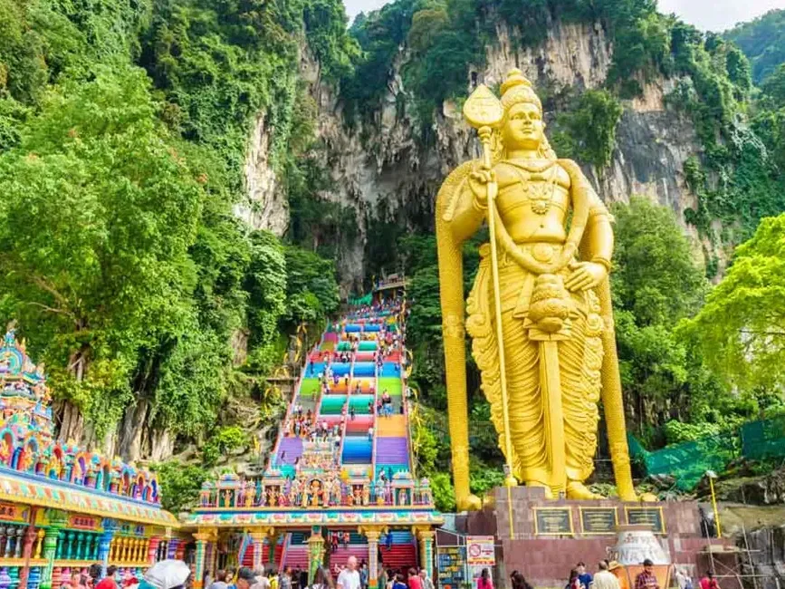 People by the Arulmigu Murugan Statue in Batu Caves, Famous places to visit in Kuala Lumpur near Imperial Lexis - Imperial Lexis Kuala Lumpur