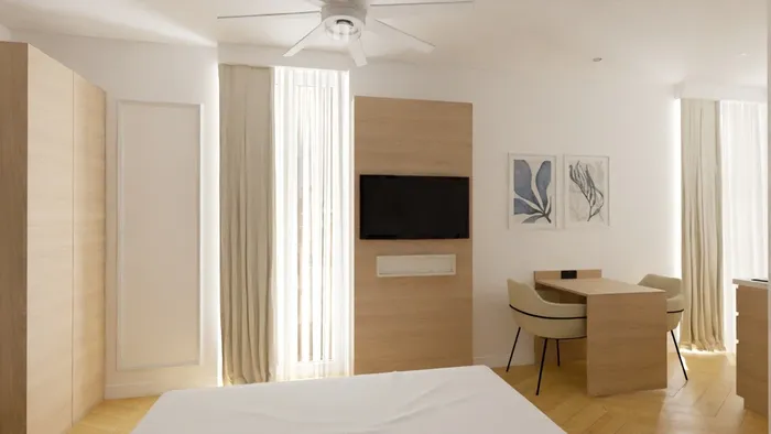 Chambre élégante avec bureau et télévision intégrée dans un mur en bois.