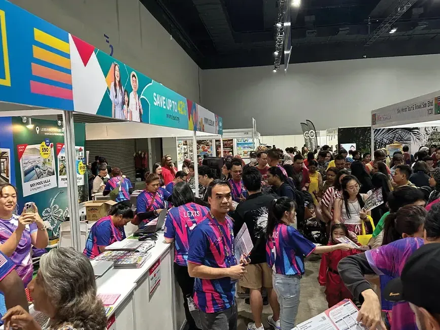 People approaching Lexis Hotel Group's booth at Matta Fair 2025 - Lexis Hotels & Resorts