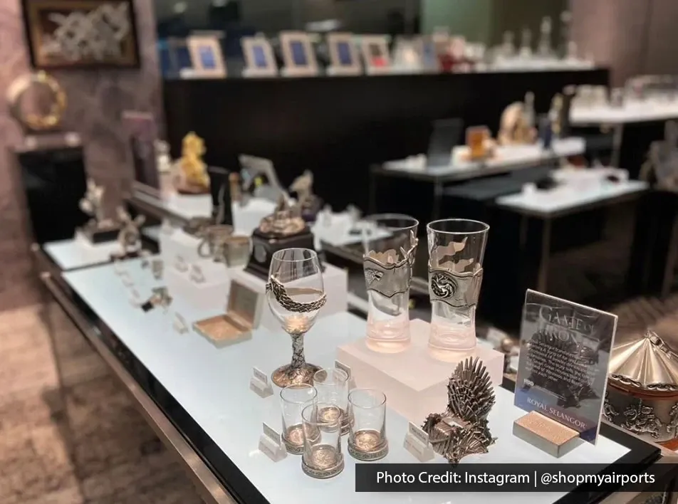 Royal Selangor souvenir shop display with glassware and decorative items at Penang International Airport