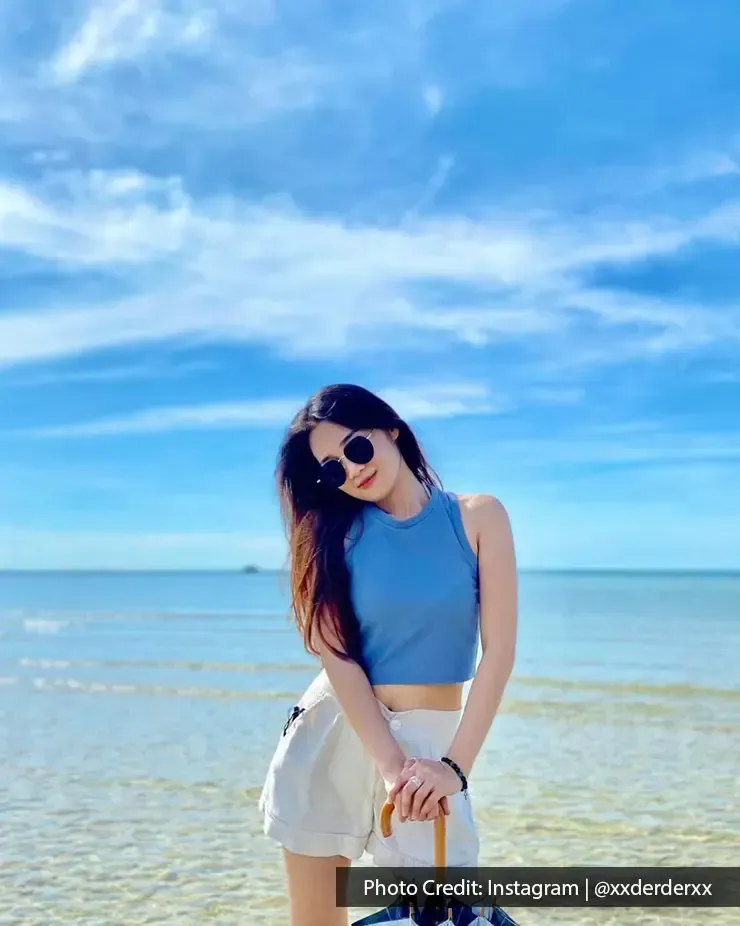 Woman posing by the sea at Blue Lagoon Beach Port Dickson - Lexis Hibiscus Port Dickson