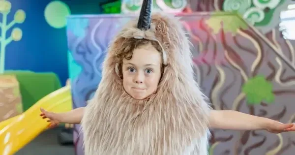 Little boy dressed in a furry costume at Capital E play centre