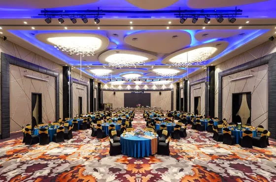 Hibiscus Grand Ballroom adorned with blue and gold lighting at Lexis Hibiscus Port Dickson