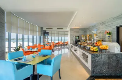 Bright wave dining with buffet counter and ocean view – Lexis Hibiscus Port Dickson