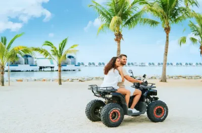 Couple enjoying an ATV ride by the beach - Lexis Hibiscus Port Dickson